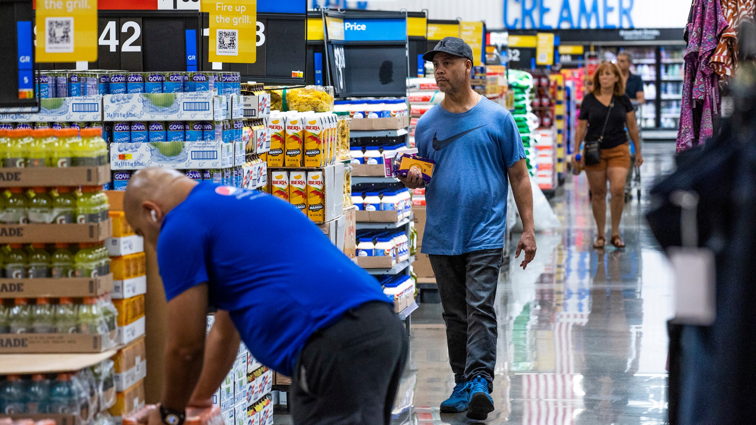 FILE - People shop at a Walmart Superstore in Secaucus, New Jersey, July 11, 2024. (AP Photo/Eduardo Munoz Alvarez, File)