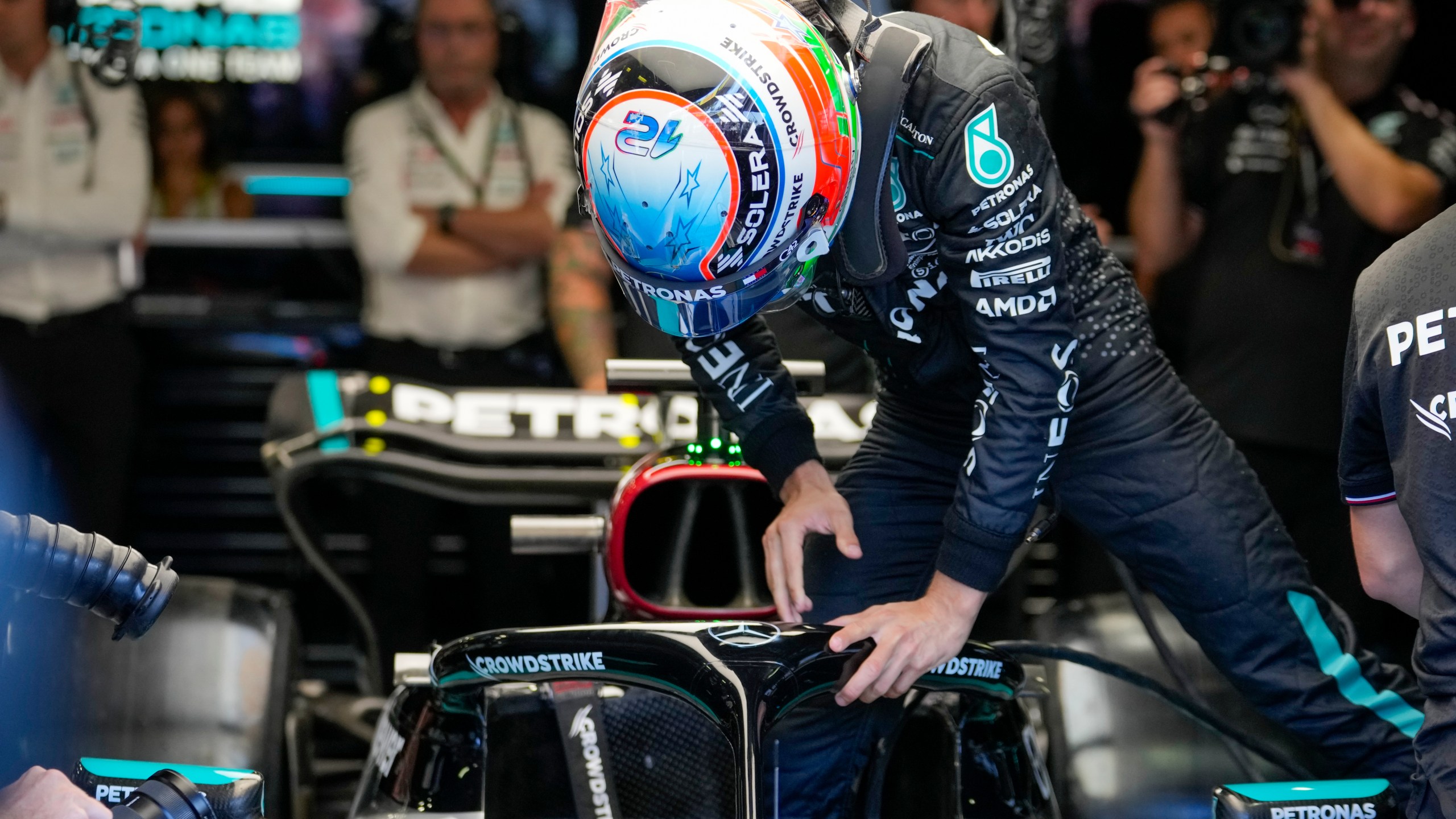 Mercedes driver Andrea Kimi Antonelli of Italy enters his car during the first free practice ahead of the Formula One Italian Grand Prix race at the Monza racetrack, in Monza, Italy, Friday, Aug. 30, 2024. (AP Photo/Luca Bruno)