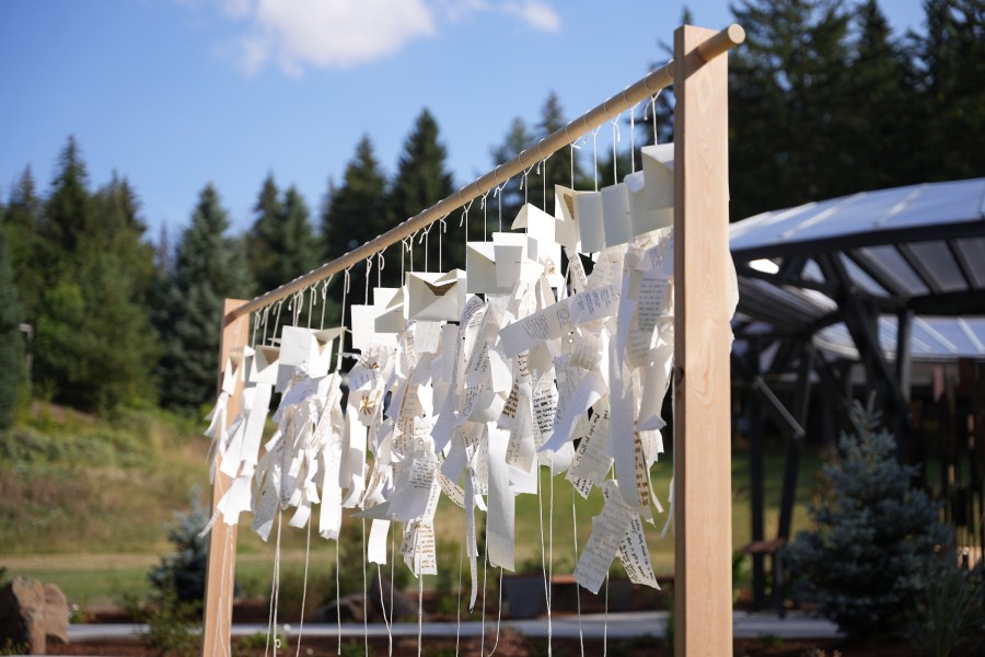 Hand written notes mourners wrote at the Vandal Healing Garden and Memorial dedication ceremony on Aug. 21, 2024.