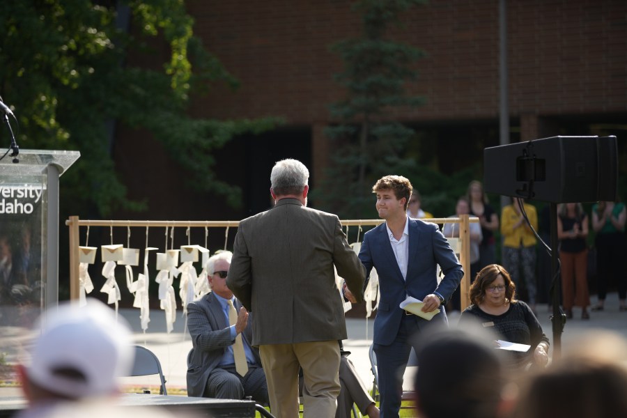 University of Idaho community members gather at the Vandal Healing Garden and Memorial dedication ceremony on Aug. 21, 2024.