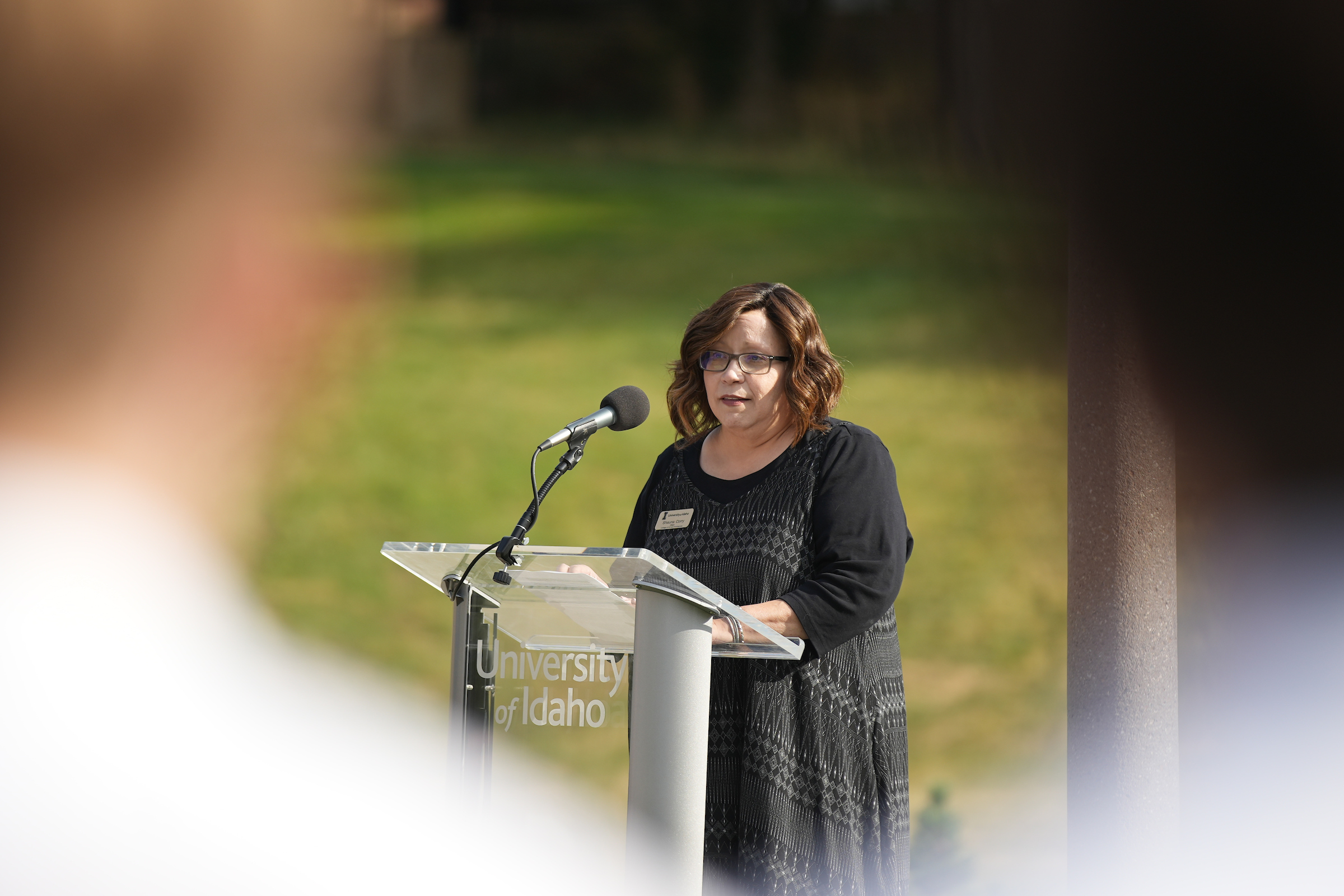 Shauna Corry, Dean of the College of Art and Architecture at the University of Idaho, speaks at the Vandal Healing Garden and Memorial dedication ceremony on Aug. 21, 2024.