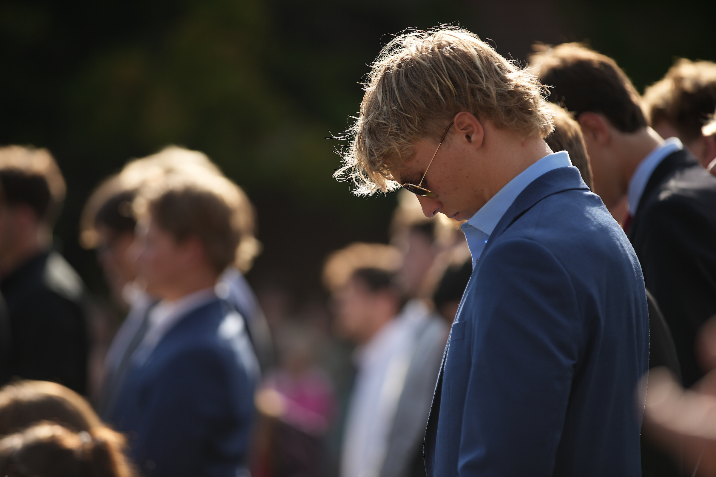 University of Idaho community members gather at the Vandal Healing Garden and Memorial dedication ceremony on Aug. 21, 2024.