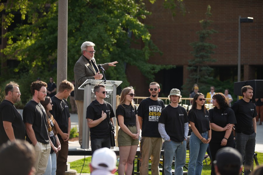 University of Idaho students who designed and built the Vandal Healing Garden and Memorial gather at the dedication ceremony on Aug. 21, 2024.