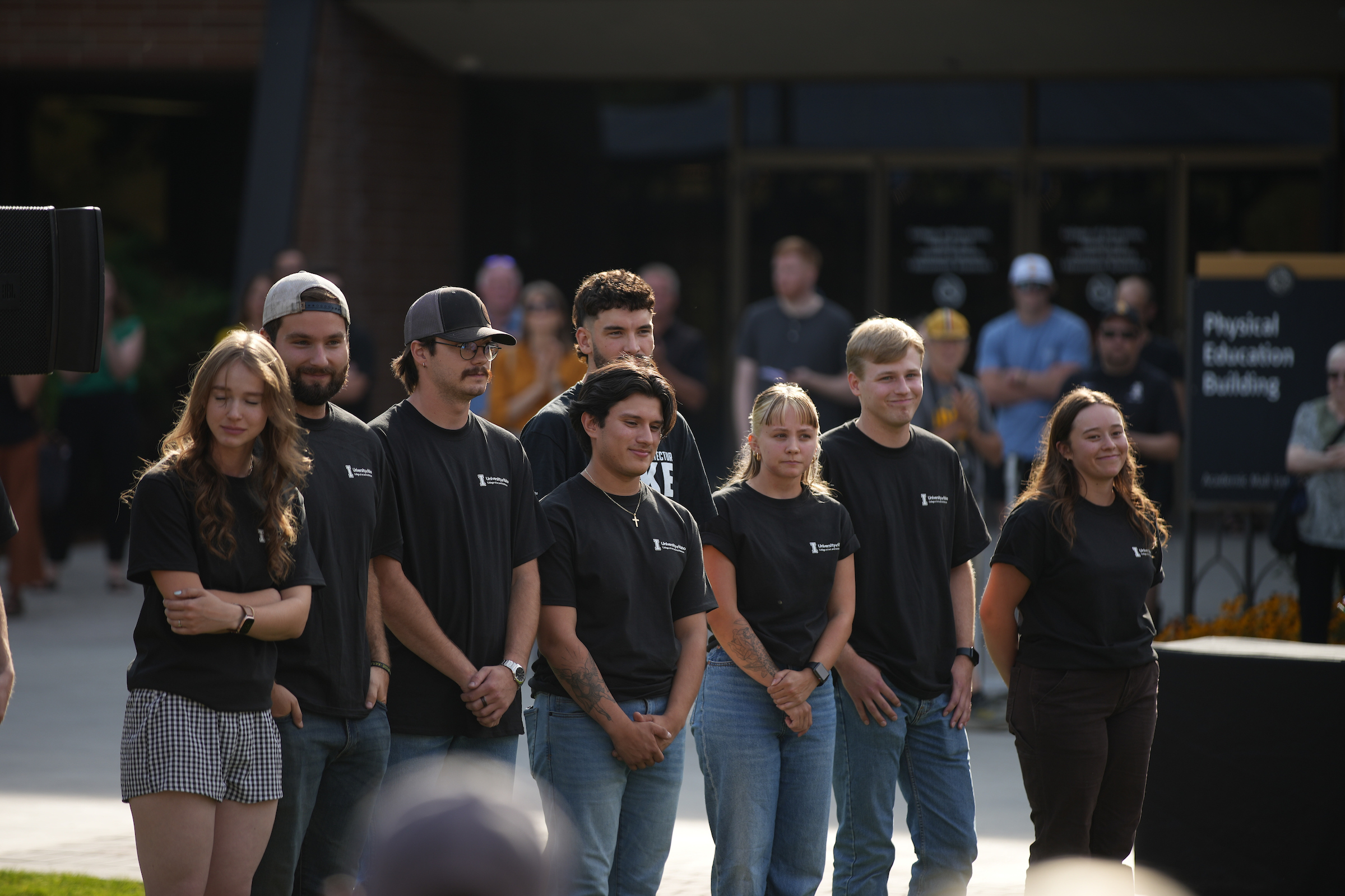 University of Idaho students who designed and built the Vandal Healing Garden and Memorial gather at the dedication ceremony on Aug. 21, 2024.