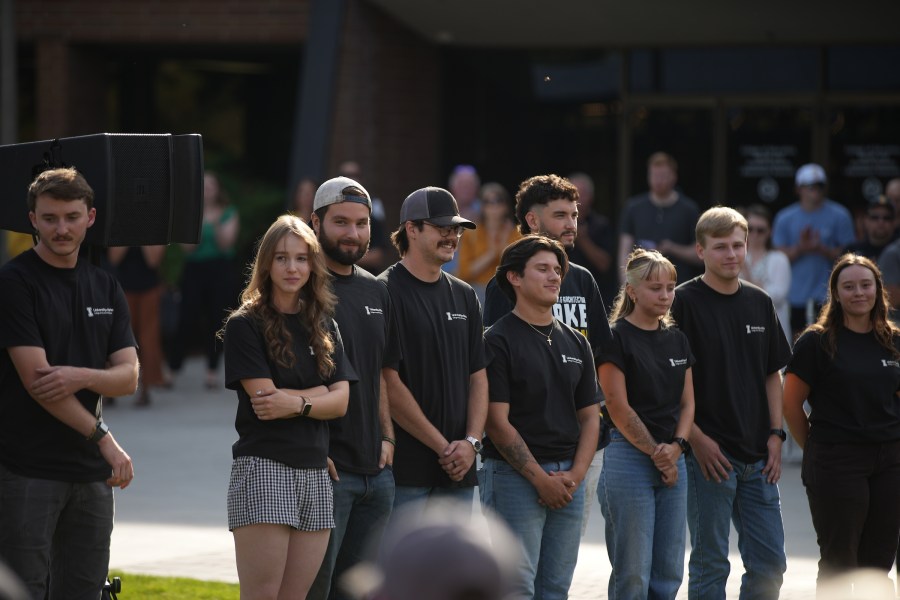 University of Idaho students who designed and built the Vandal Healing Garden and Memorial gather at the dedication ceremony on Aug. 21, 2024.