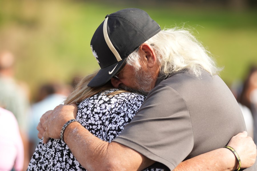 University of Idaho community members gather at the Vandal Healing Garden and Memorial dedication ceremony on Aug. 21, 2024.