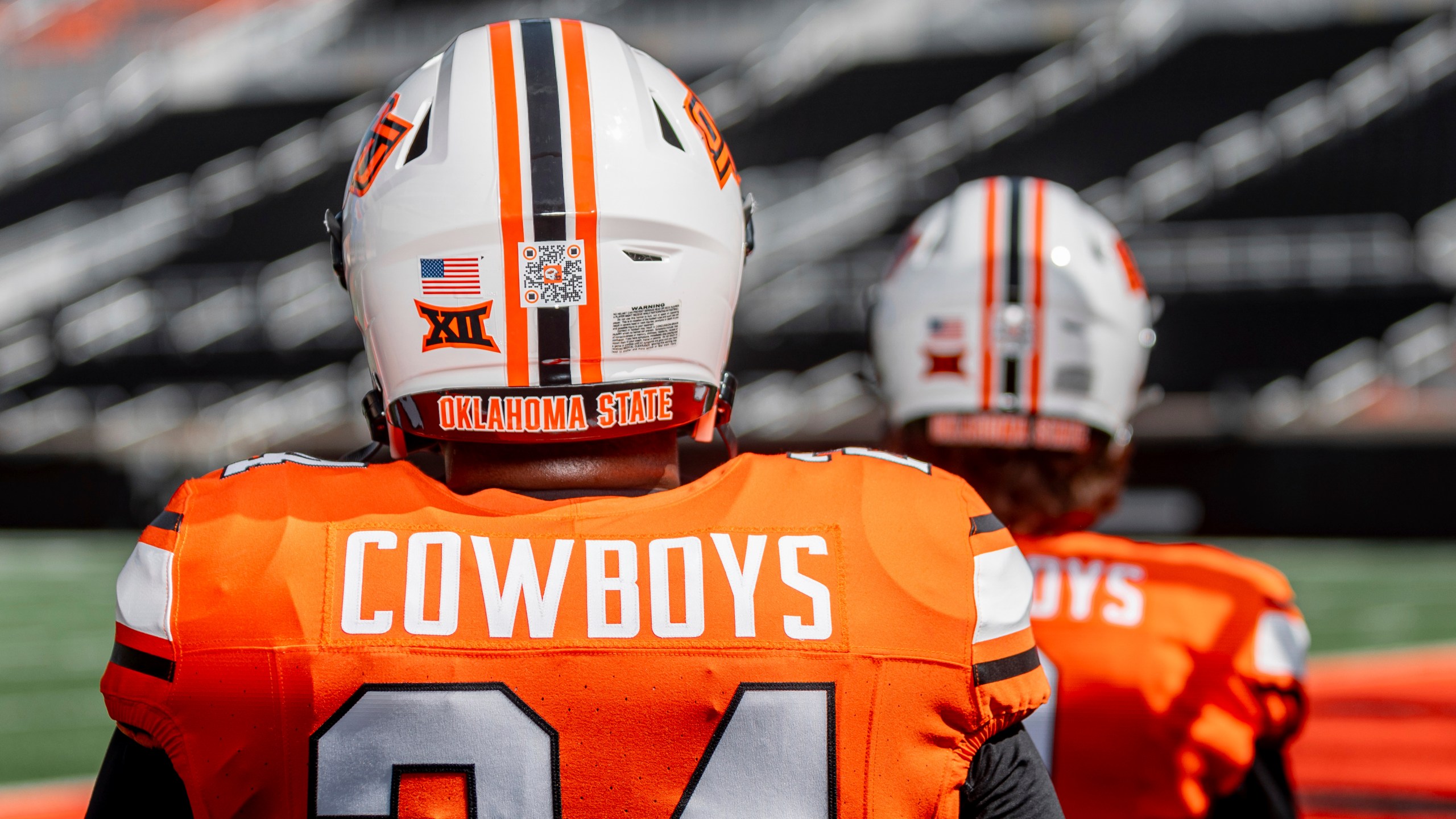 A QR code on an Oklahoma State NCAA college football helmet is seen on Thursday, Aug. 15, 2024,