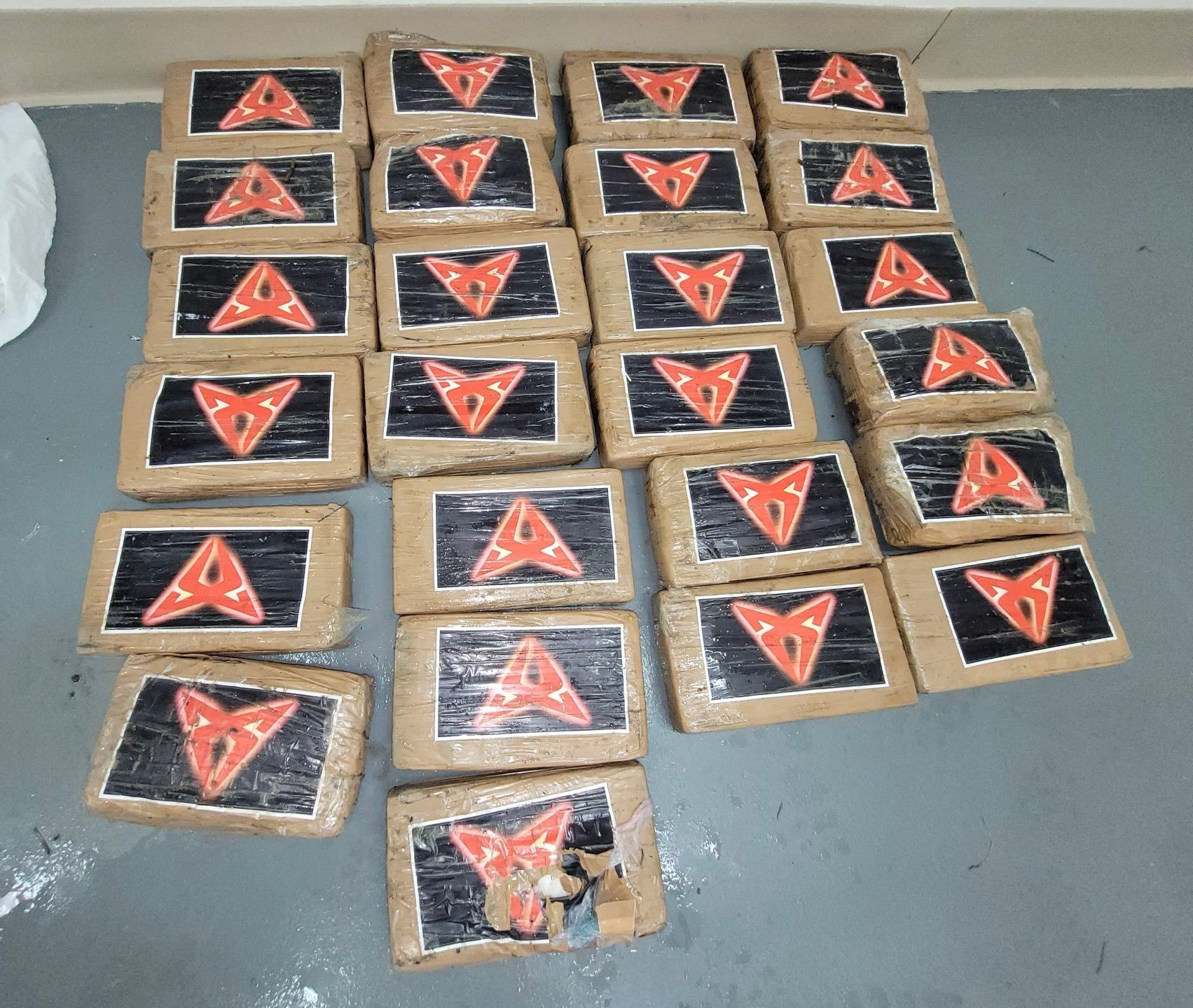 Pictured is 70 pounds of cocaine in individual blocks, which washed ashore during Hurricane Debby.