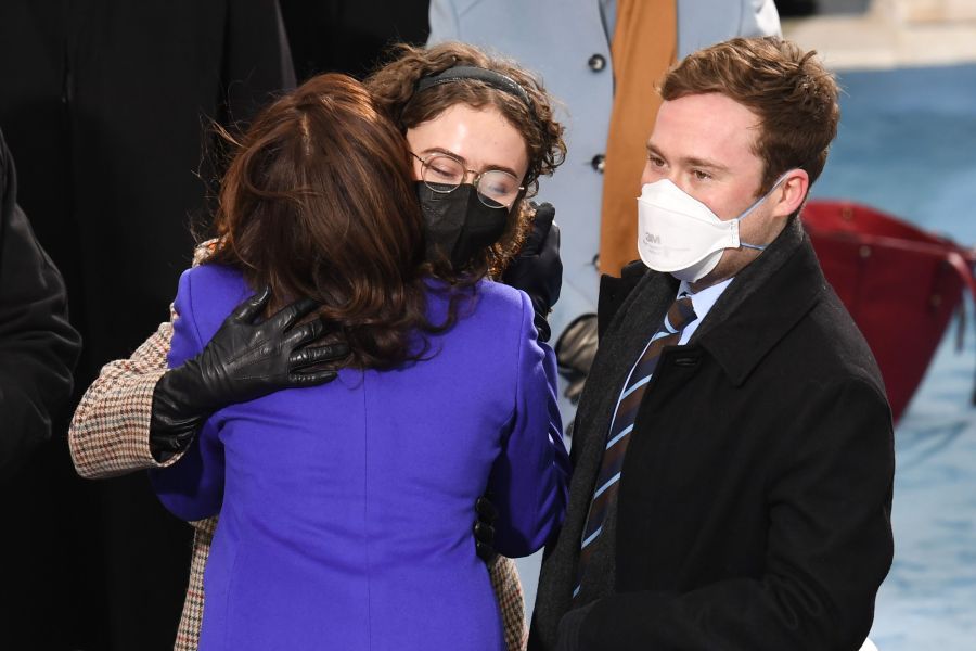 Vice President-Elect Kamala Harris (L) greets stepchildren Cole Emhoff and Ella Emhoff as she arrives for the inauguration of Joe Biden as the 46th US President on January 20, 2021.