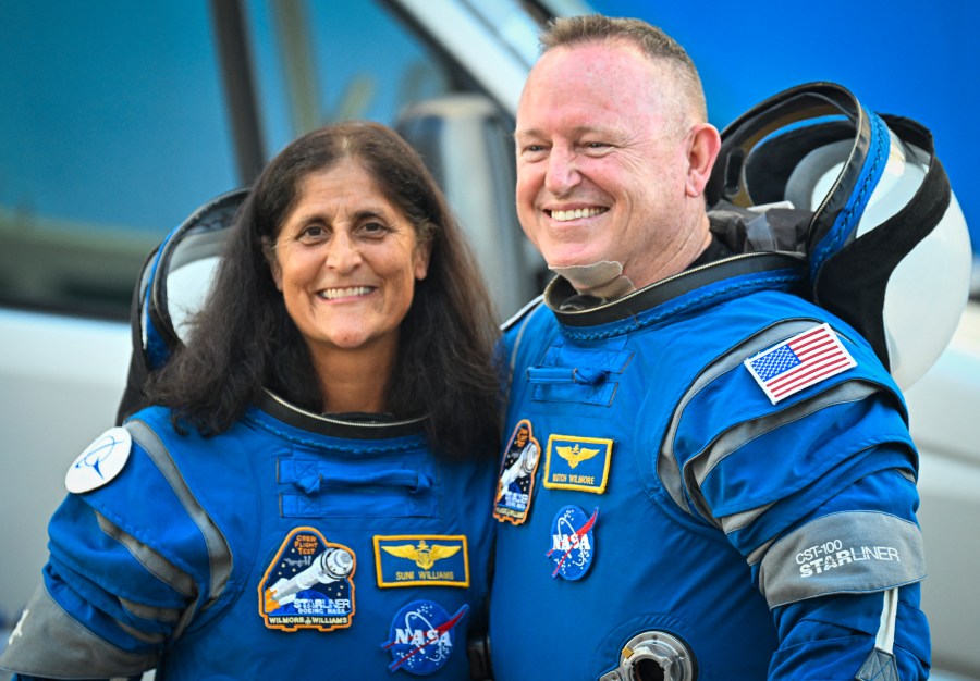 NASA astronauts Butch Wilmore (R) and Suni Williams