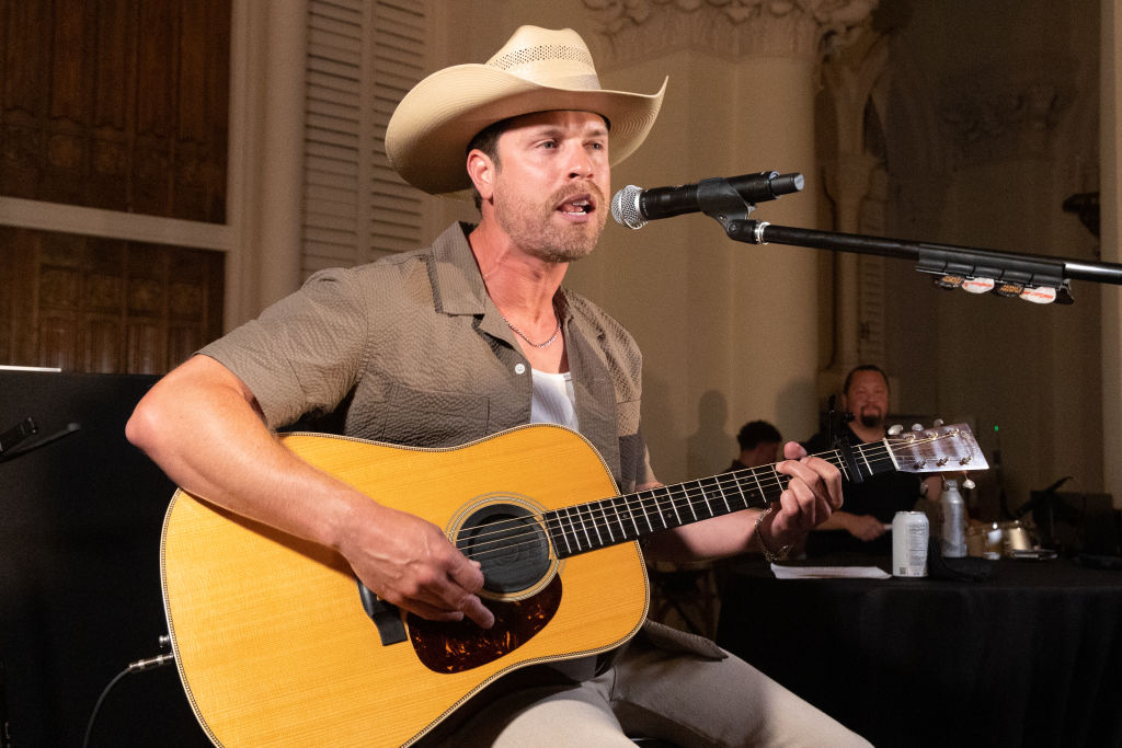 Dustin Lynch performs during a birthday celebration.