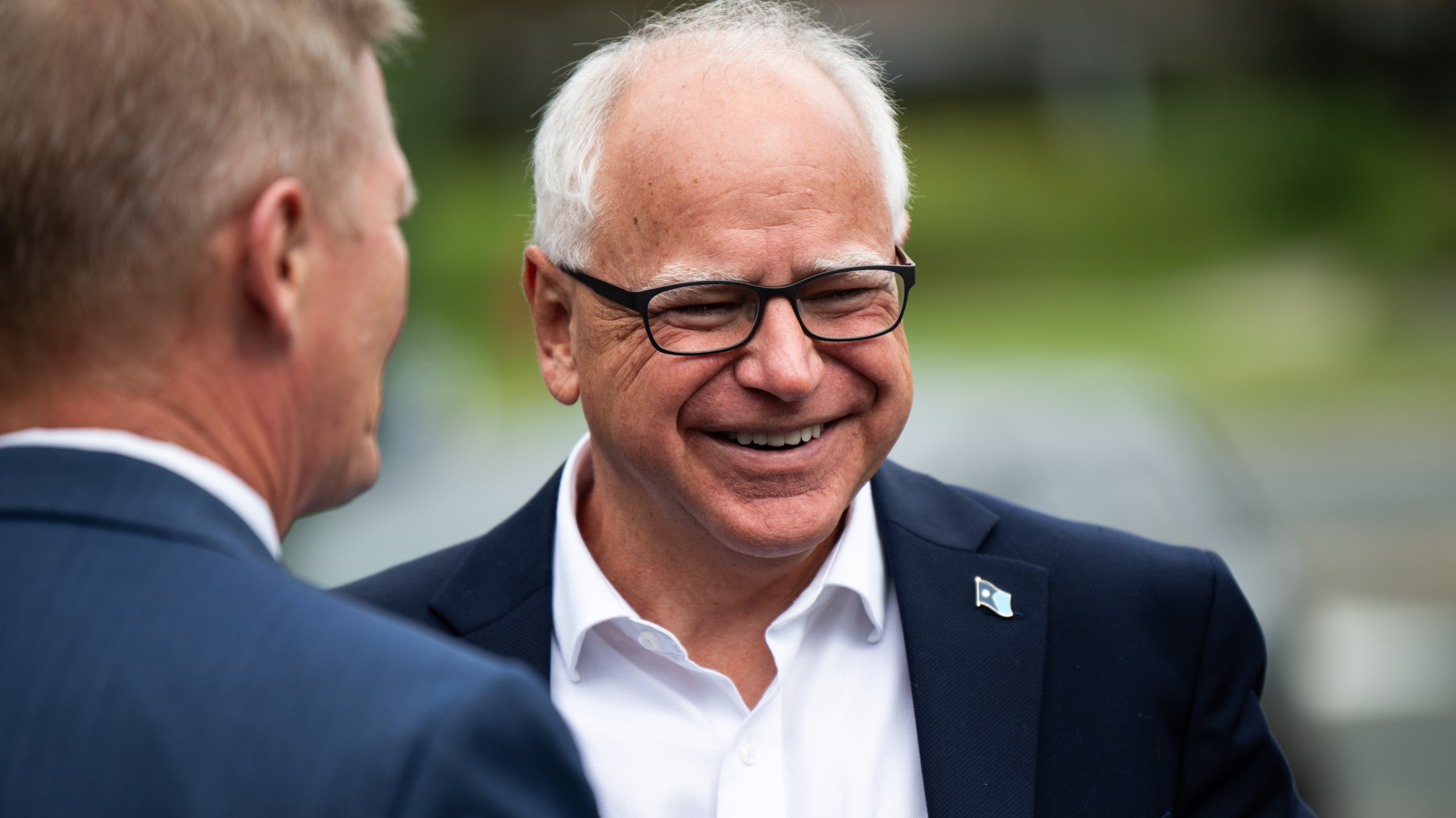 Minnesota Governor Tim Walz arrives to speak at a press conference regarding new gun legislation.