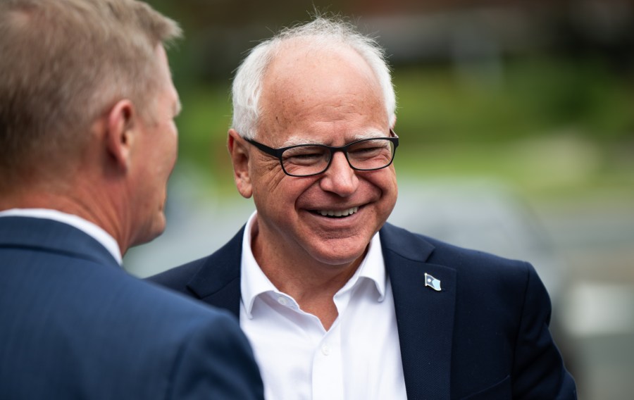 Minnesota Governor Tim Walz arrives to speak at a press conference regarding new gun legislation.