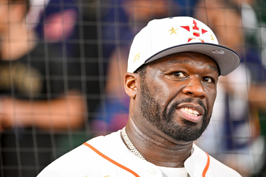 Rapper 50 Cent looks off prior to the game between the Houston Astros and Pittsburgh Pirates at Minute Maid Park on July 30, 2024 in Houston, Texas.