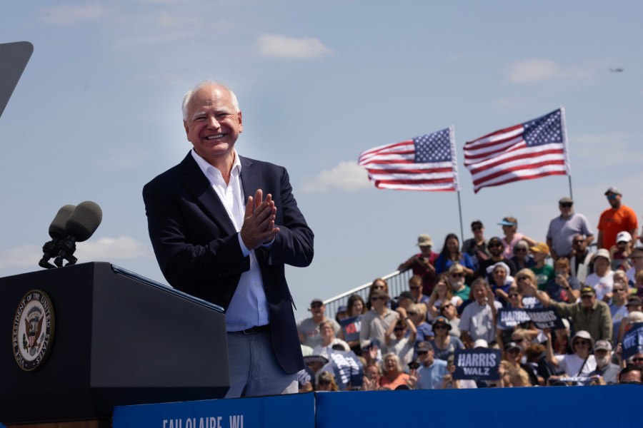 Democratic vice presidential candidate, Minnesota Gov. Tim Walz speaks at a campaign rally with Vice President Kamala Harris on August seventh in Eau Claire, Wisconsin.