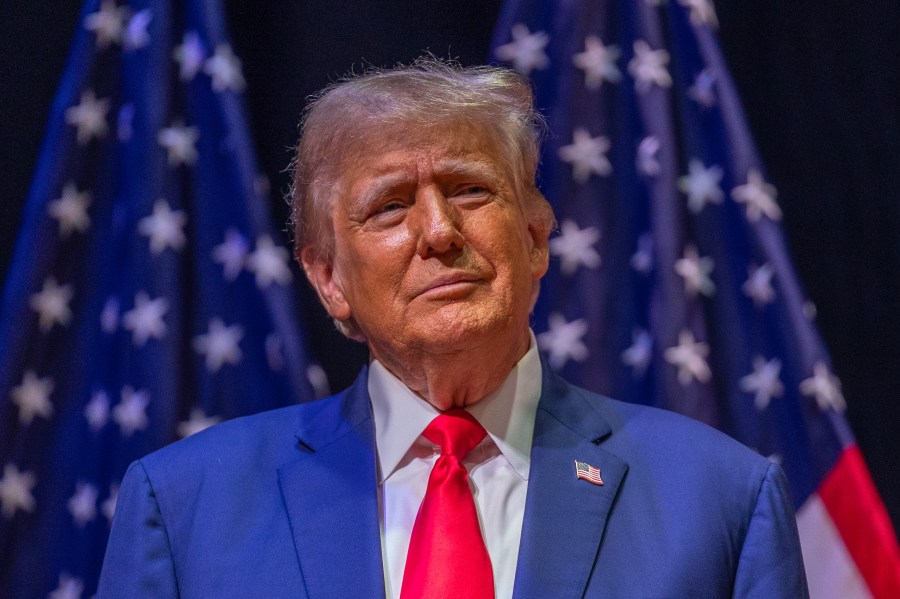 Republican presidential nominee former President Donald Trump arrives to speak at a campaign event.