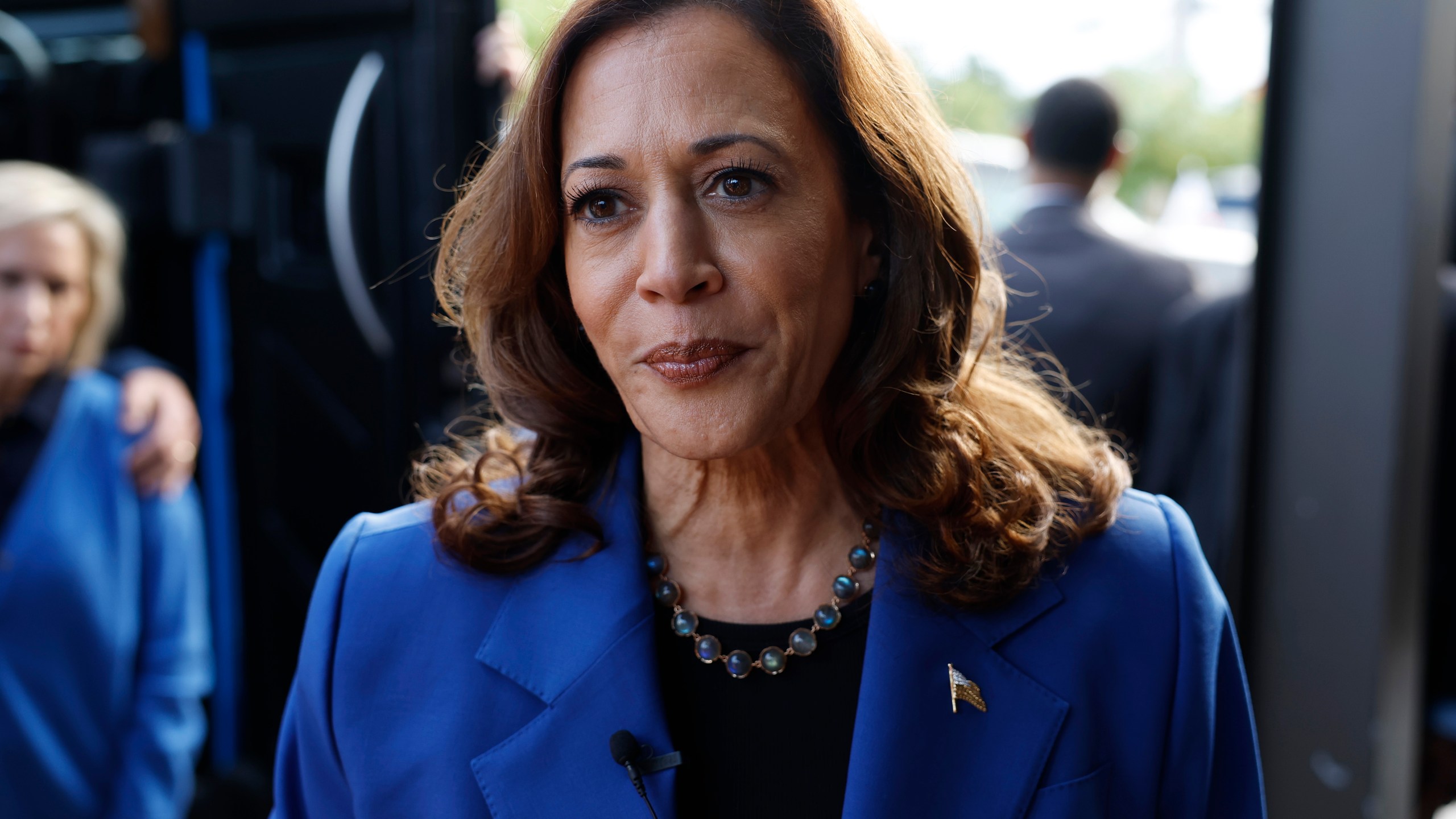 Kamala Harris speaks to reporters.