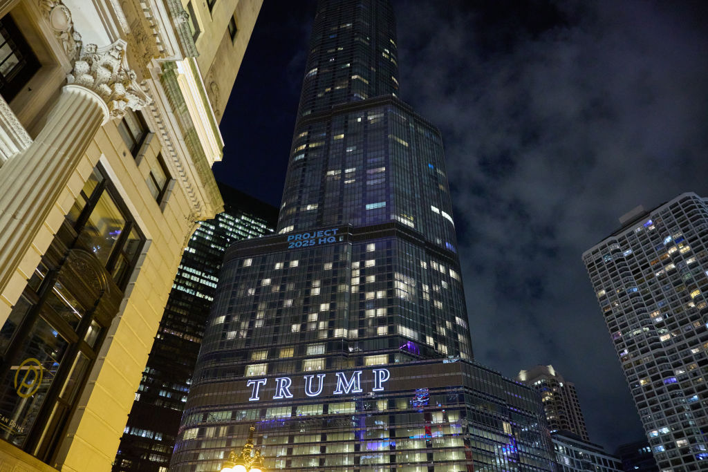 "Project 2025 HQ" projected onto the outside of the Trump Hotel before the Democratic National Convention in Chicago.