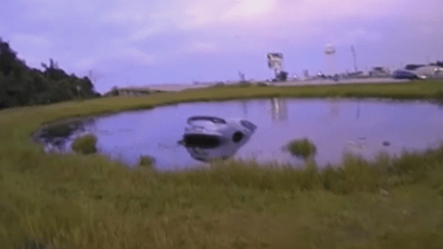 A vehicle is submerged in a pond in West Orange, Texas