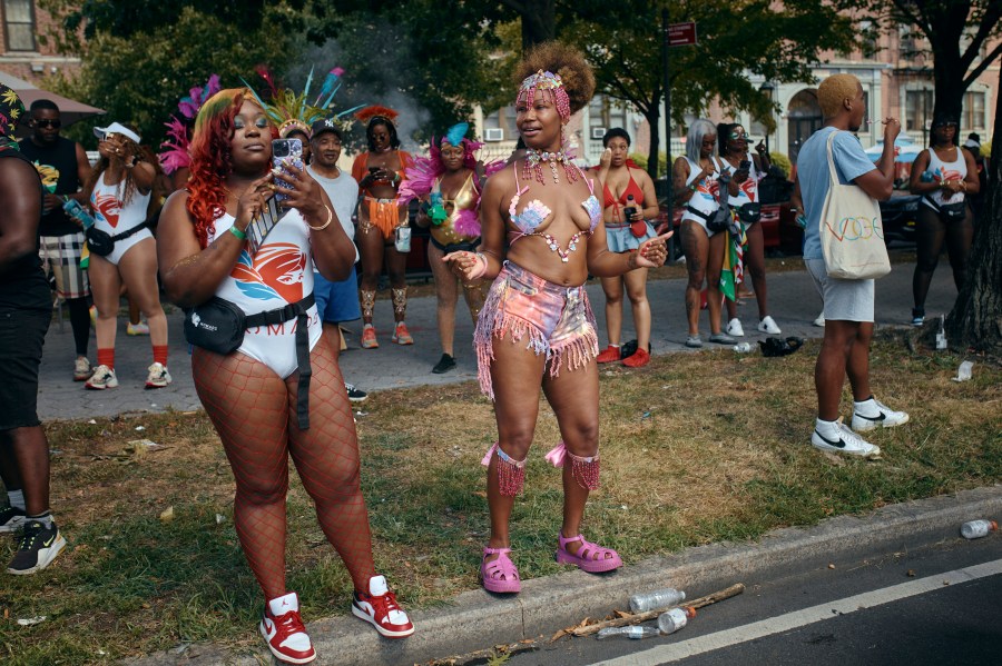 Revelers dance during the West Indian Day Parade on Monday, Sept. 2, 2024, in the Brooklyn borough of New York. (AP Photo/Andres Kudacki)