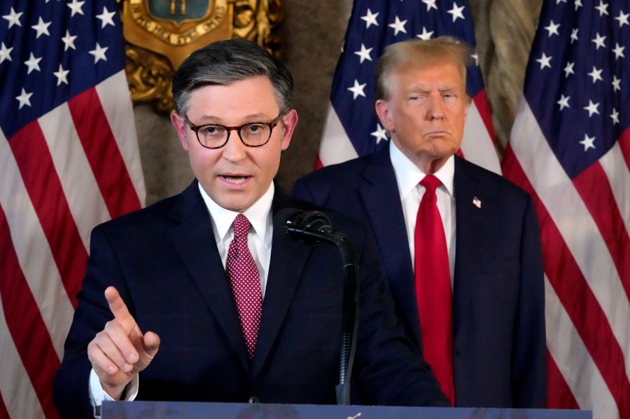 FILE - Speaker of the House Mike Johnson, R-La., speaks as Republican presidential candidate former President Donald Trump listens during a news conference, April 12, 2024, at Mar-a-Lago in Palm Beach, Fla. (AP Photo/Wilfredo Lee, File)