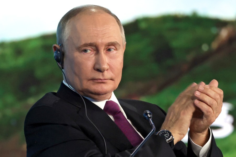 Russian President Vladimir Putin applauds during the plenary session of the Eastern Economic Forum in Vladivostok, Russia, Thursday, Sept. 5, 2024. (Vyacheslav Prokofyev, Sputnik, Kremlin Pool Photo via AP)