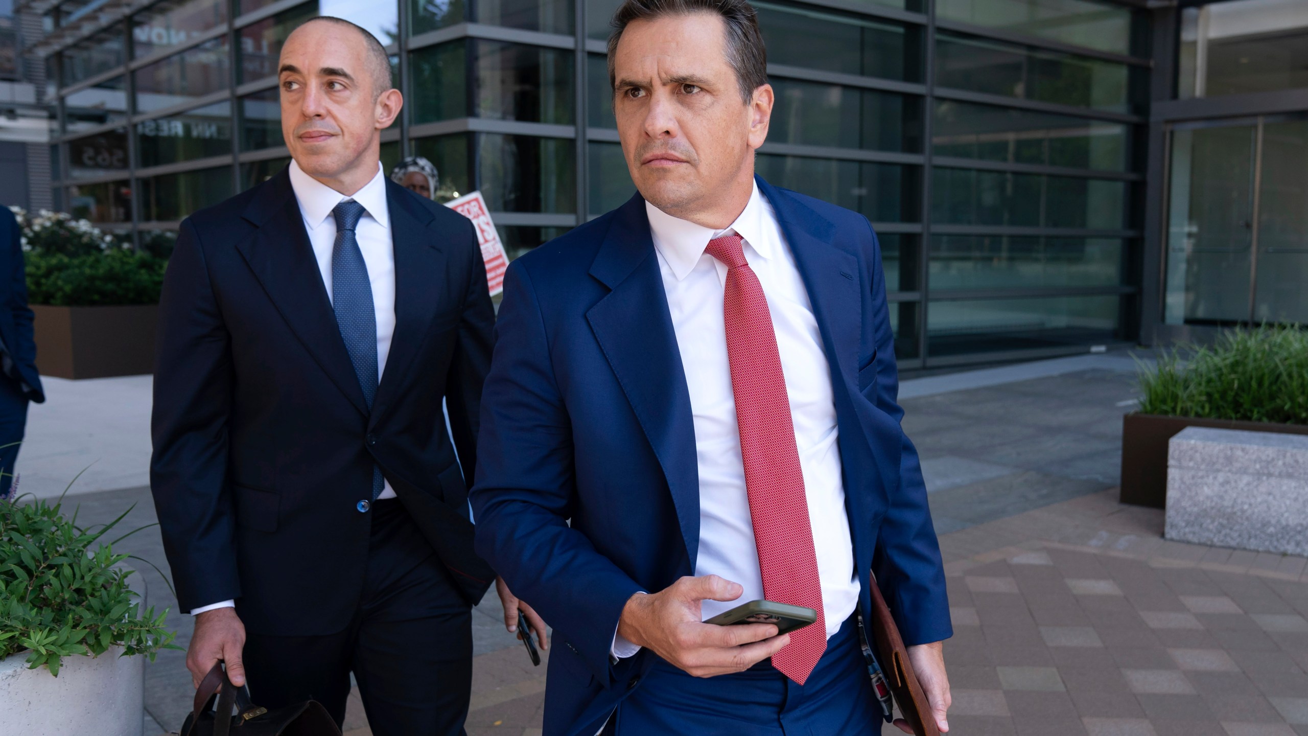 Former President Donald Trump attorneys Emil Bove, left, and Todd Blanche leave the U.S. Federal Courthouse, after a hearing, Thursday, Sep. 5, 2024, in Washington. A judge is hearing arguments about potential next steps in the federal election subversion prosecution of Donald Trump in the first hearing since the Supreme Court narrowed the case by ruling that former presidents are entitled to broad immunity from criminal charges. (AP Photo/Jose Luis Magana)