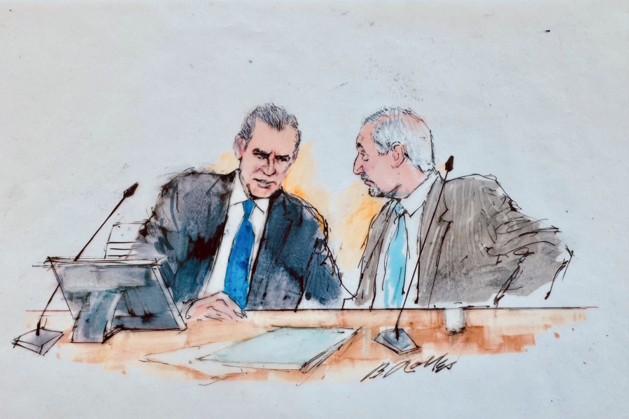 In this courtroom sketch, Hunter Biden, left, talks to attorney Mark Geragos, during a hearing in federal court, Thursday, Sept. 5, 2024, in Los Angeles, where he pled guilty to federal tax charges. (William T. Robles via AP)