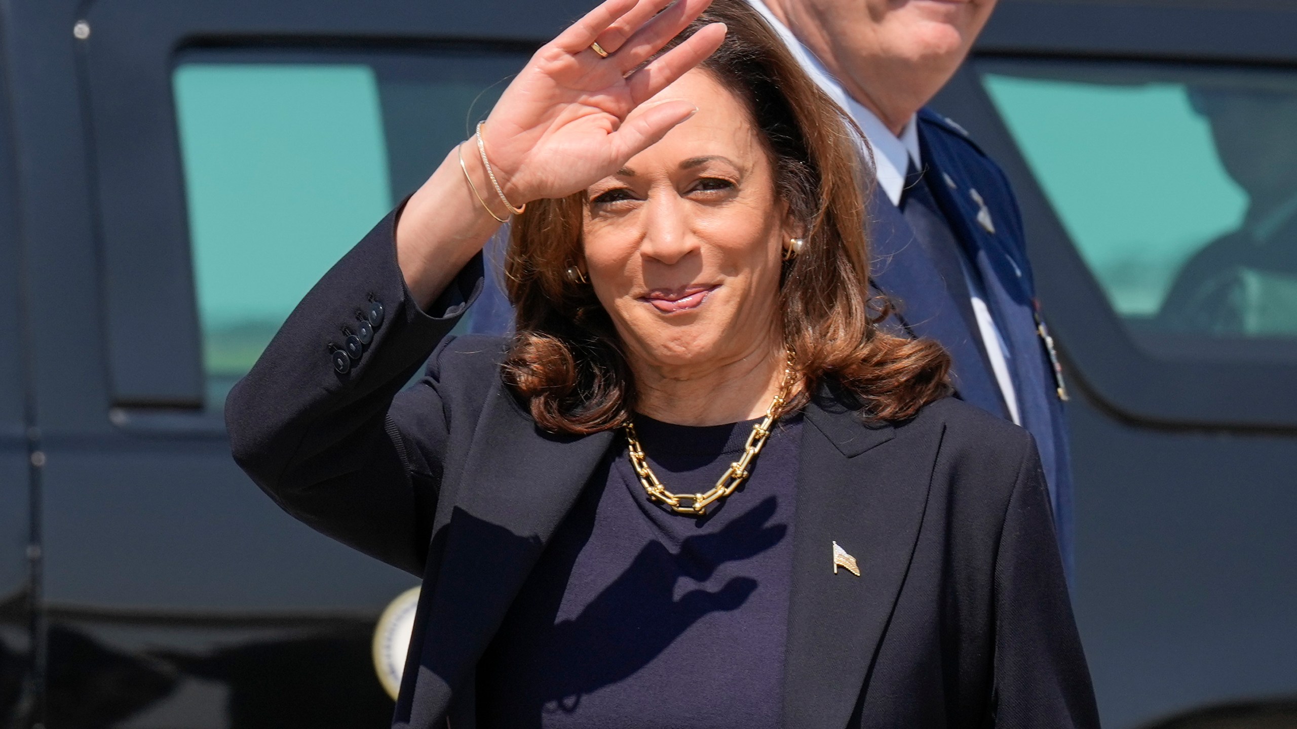 Democratic presidential nominee Vice President Kamala Harris waving to media members as she arrives at Pittsburgh International Airport, in Coraopolis, Pa., Thursday, Sept. 5, 2024, where she is expected to prepare for the first presidential debate. (AP Photo/Jacquelyn Martin)