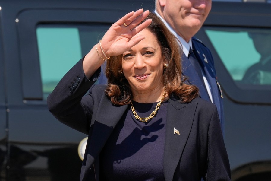 Democratic presidential nominee Vice President Kamala Harris waving to media members as she arrives at Pittsburgh International Airport, in Coraopolis, Pa., Thursday, Sept. 5, 2024, where she is expected to prepare for the first presidential debate. (AP Photo/Jacquelyn Martin)