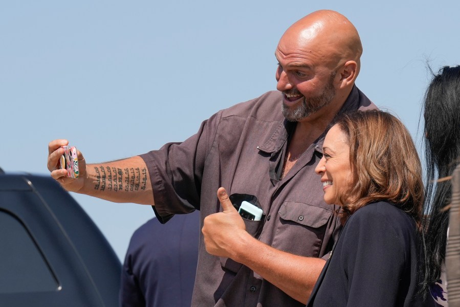 Democratic presidential nominee Vice President Kamala Harris arrives in Pittsburgh International Airport, in Coraopolis, Pa., Thursday, Sept. 5, 2024, and takes a selfie with Sen. John Letterman, D-Pa. (AP Photo/Jacquelyn Martin)