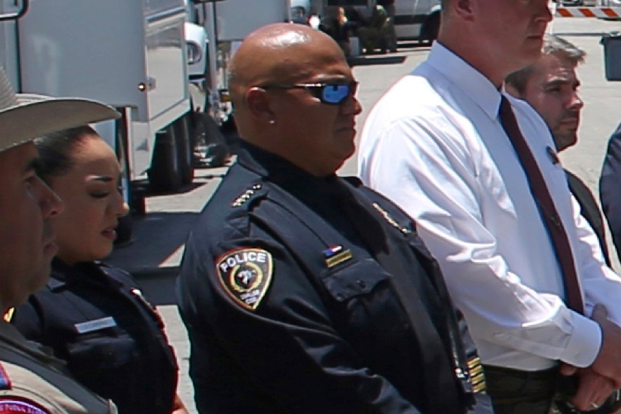 FILE - Uvalde School Police Chief Pete Arredondo, third from left, stands during a news conference outside of the Robb Elementary school on May 26, 2022, in Uvalde, Texas. (AP Photo/Dario Lopez-Mills, File)