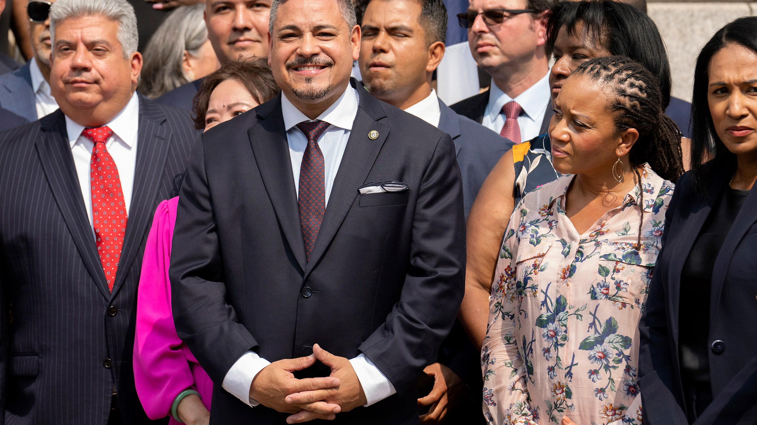 FILE - NYPD Police Commissioner Edward A. Caban, center, and First Deputy Mayor Sheena Wright, second from right, attend a press conference outside New York City Police Department 40th Precinct on Monday, July 17, 2023, in New York. (AP Photo/Jeenah Moon, File)