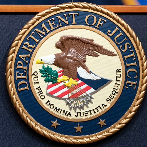 FILE - The Department of Justice seals is seen during a news conference at the DOJ office in Washington, May 16, 2023. (AP Photo/Jose Luis Magana, File)