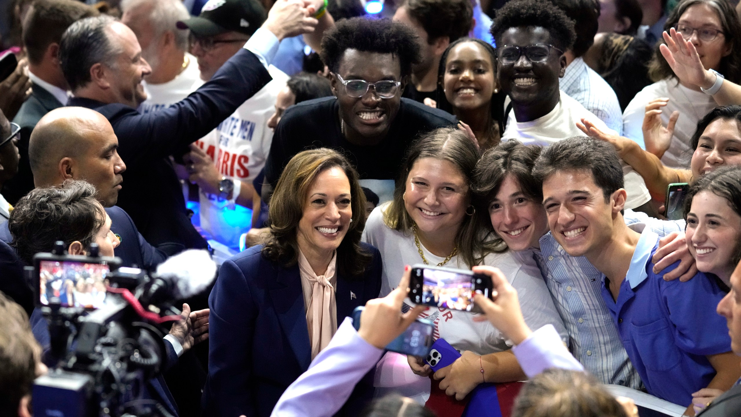 FILE - Democratic presidential nominee Vice President Kamala Harris poses for a photo with supporters at a campaign rally in Philadelphia, Aug. 6, 2024. (AP Photo/Matt Rourke, File)