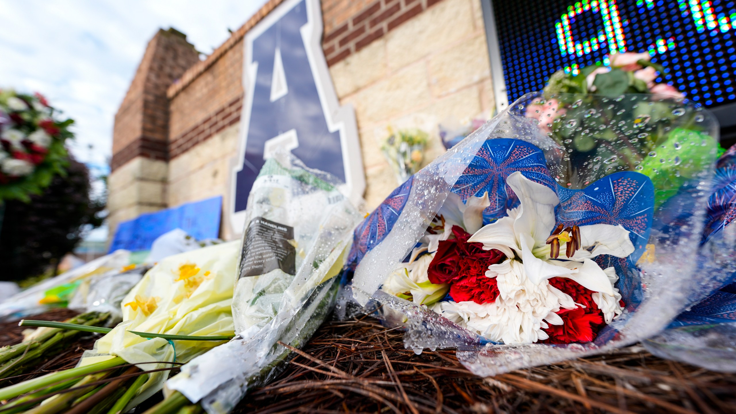 A memorial is seen at Apalachee High School after the Wednesday school shooting, Saturday, Sept. 7, 2024, in Winder, Ga. (AP Photo/Mike Stewart)