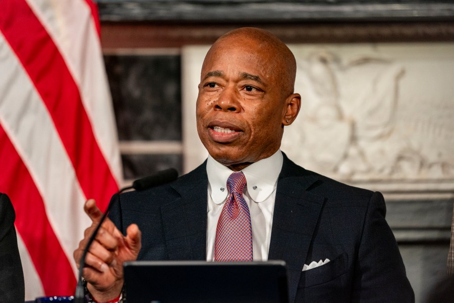 FILE - Mayor Eric Adams speaks during a press conference at City Hall in New York, Dec. 12, 2023. (AP Photo/Peter K. Afriyie, File)