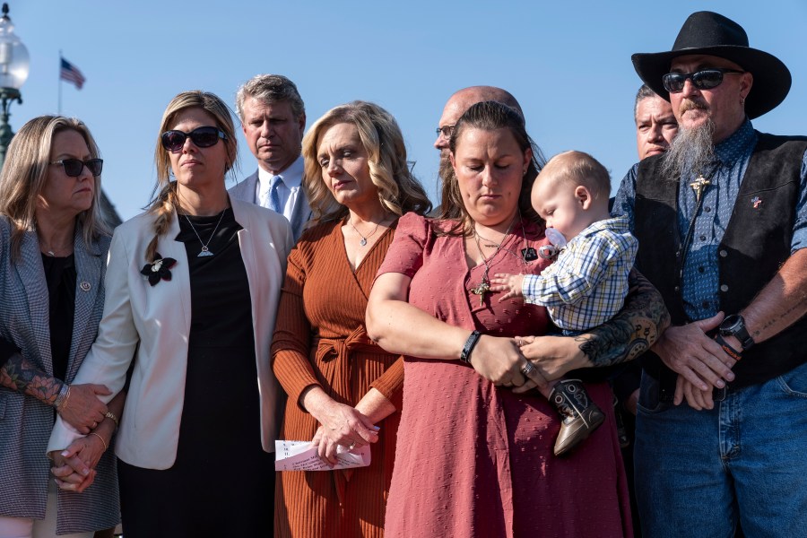 Families of American military members who were killed during the evacuation in Kabul, listen as House Foreign Affairs Committee Chairman Michael McCaul, R-Texas, speaks to reporters about his panel's Afghanistan Report and the findings of its three-year investigation into the U.S. withdrawal from Afghanistan, at the Capitol in Washington, Monday, Sept. 9, 2024. (AP Photo/J. Scott Applewhite)