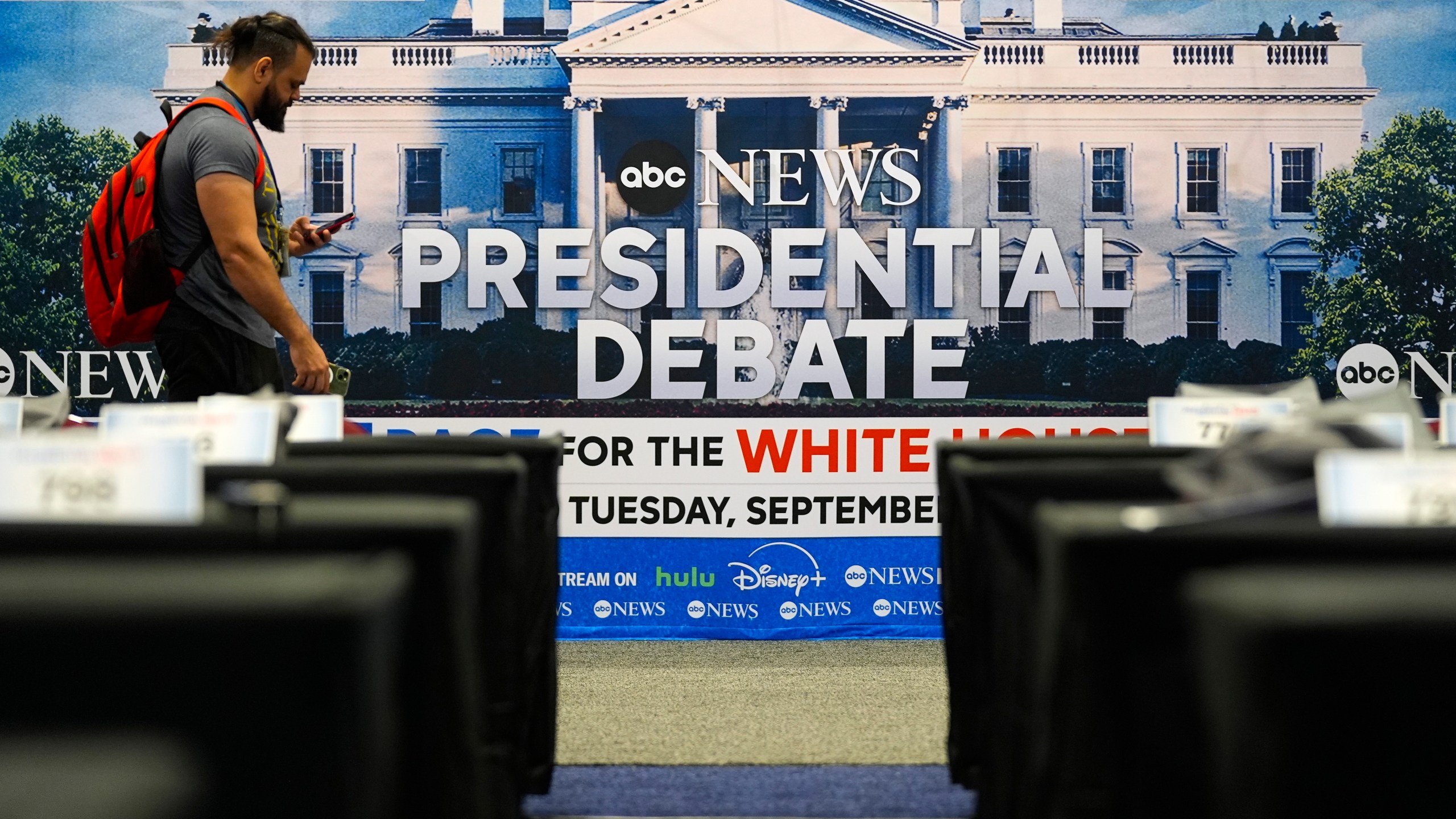 Signage at the media filing center ahead of tomorrow's presidential debate between Republican presidential candidate former President Donald Trump and Democratic presidential nominee Vice President Kamala Harris, Monday, Sept. 9, 2024, in Philadelphia. (AP Photo/Pablo Martinez Monsivais)