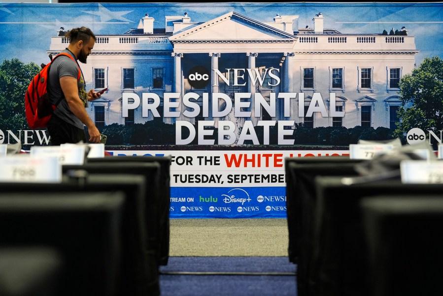 Signage at the media filing center ahead of tomorrow's presidential debate between Republican presidential candidate former President Donald Trump and Democratic presidential nominee Vice President Kamala Harris, Monday, Sept. 9, 2024, in Philadelphia. (AP Photo/Pablo Martinez Monsivais)