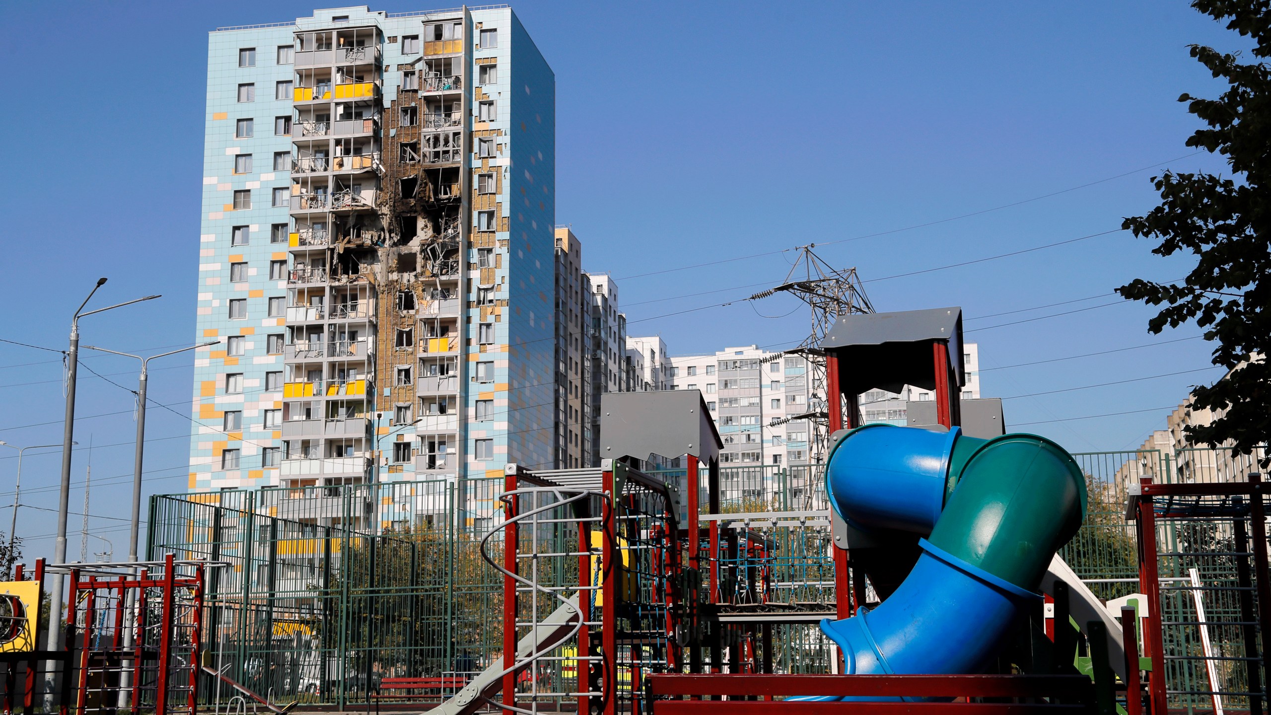 A view of the site of the damaged multi-storey residential building with the children's playground, foreground, following an alleged Ukrainian drone attack in Ramenskoye, outside Moscow, Moscow region, Russia, on Tuesday, Sept. 10, 2024. (AP Photo)