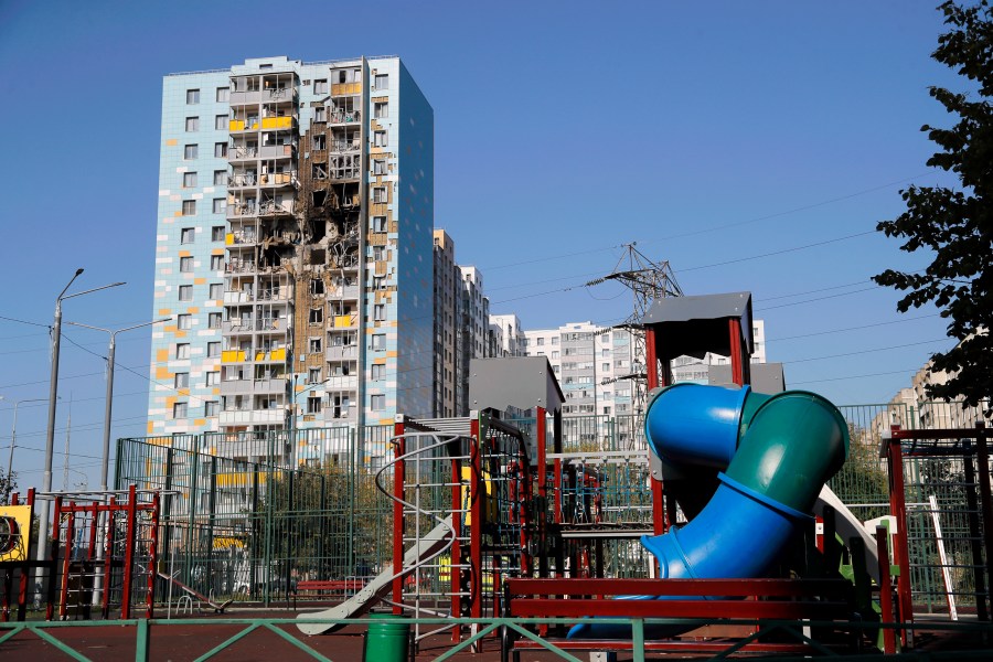 A view of the site of the damaged multi-storey residential building with the children's playground, foreground, following an alleged Ukrainian drone attack in Ramenskoye, outside Moscow, Moscow region, Russia, on Tuesday, Sept. 10, 2024. (AP Photo)