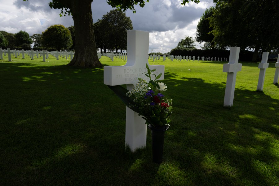 Eighty years after the liberation of the south of the Netherlands the grave of Second Lt. Royce Taylor, a bombardier with the 527 Bomb Squadron, center, stands among the 8,288 crosses and Star of David headstones at the Netherlands American Cemetery in Margraten, southern Netherlands, on Wednesday, Sept. 11, 2024. (AP Photo/Peter Dejong)