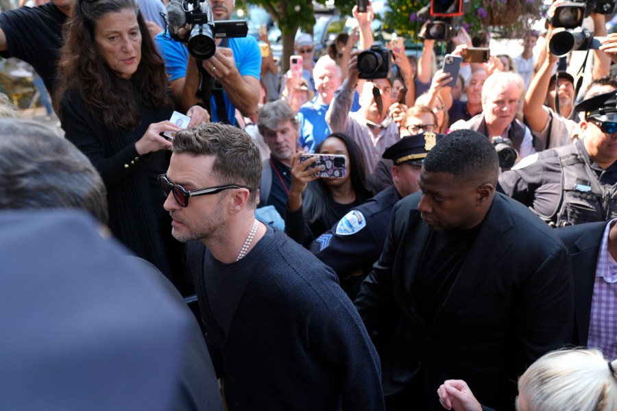 Justin Timberlake, left, walks into court for a hearing, Friday, Sept. 13, 2024, in Sag Harbor, N.Y. (AP Photo/Pamela Smith)