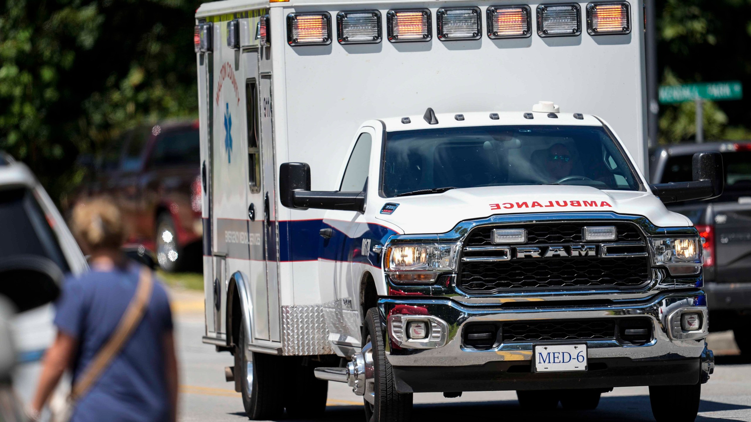 An ambulance departs Apalachee High School after a shooting at the school, Wednesday, Sept. 4, 2024, in Winder, Ga. (AP Photo/Mike Stewart)