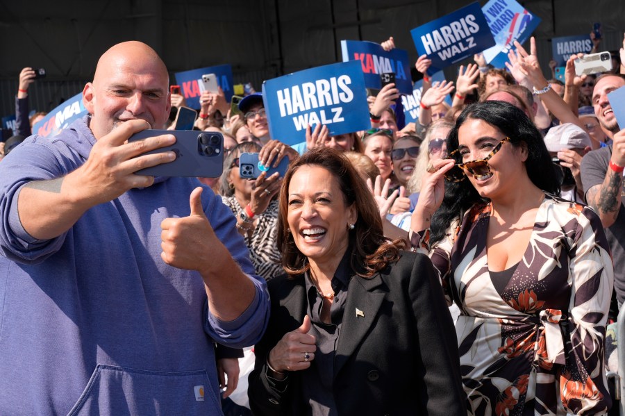 Democratic presidential nominee Vice President Kamala Harris takes a selfie with Sen. John Letterman, D-Pa., and his wife Gisele Barreto Fetterman, after Harris arrived at John Murtha Johnstown-Cambria Airport, in Johnstown, Pa., for a campaign event, Friday, Sept. 13, 2024. (AP Photo/Jacquelyn Martin)