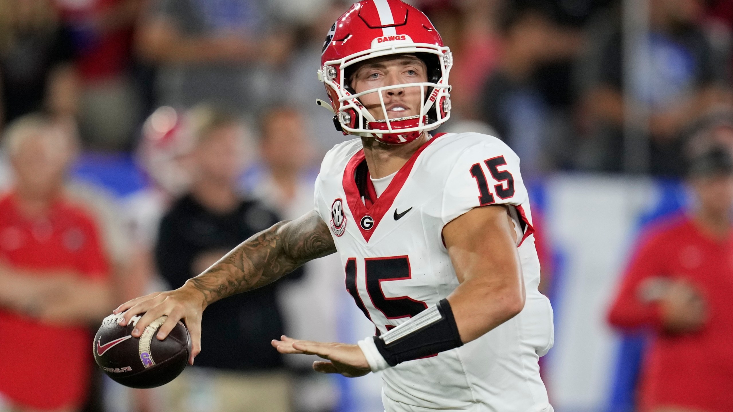 Georgia quarterback Carson Beck throws during the first half of an NCAA college football game against Kentucky, Saturday, Sept. 14, 2024, in Lexington, Ky. (AP Photo/Darron Cummings)