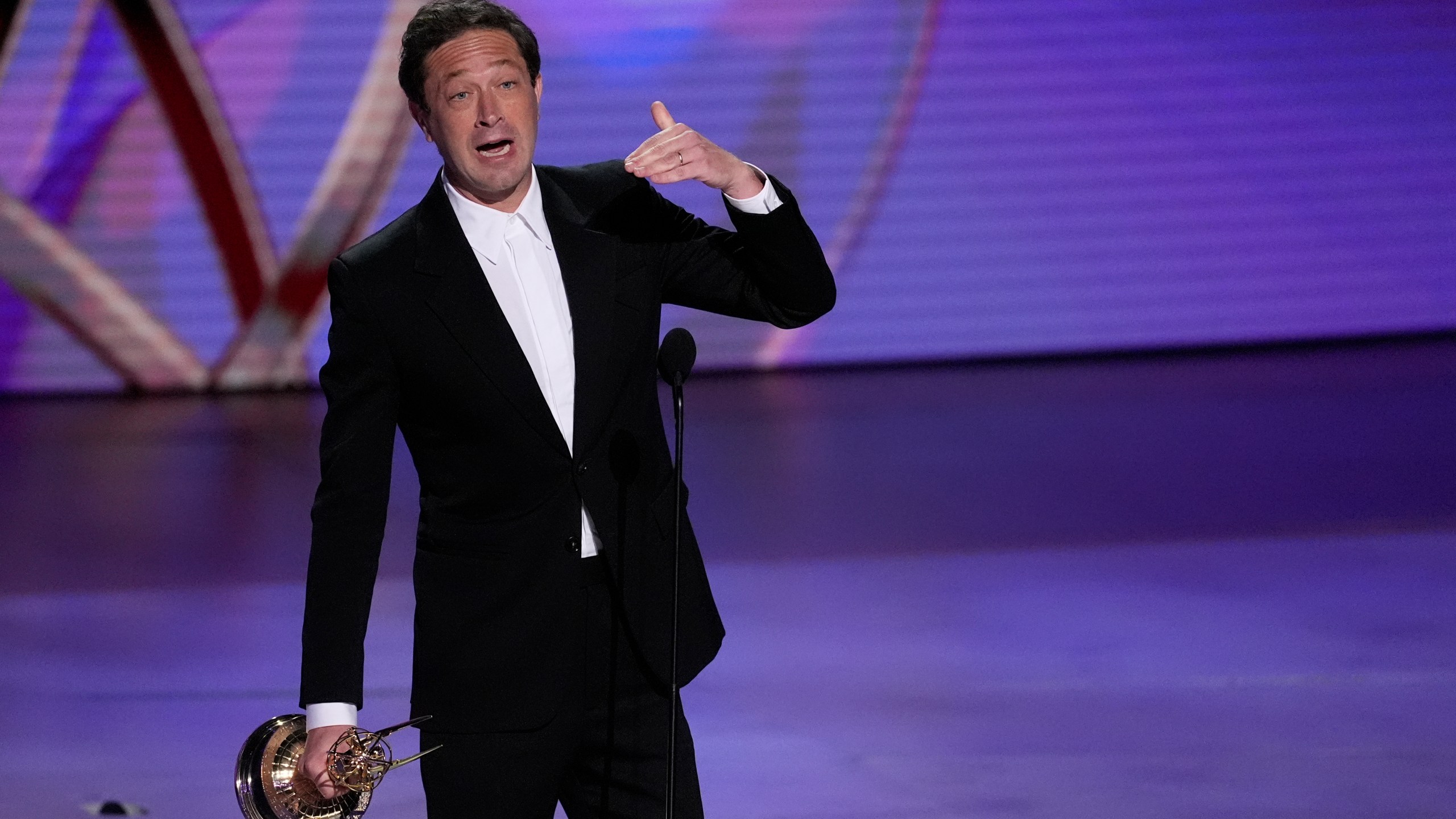 Ebon Moss-Bachrach accepts the award for outstanding supporting actor in a comedy series for "The Bear" during the 76th Primetime Emmy Awards on Sunday, Sept. 15, 2024, at the Peacock Theater in Los Angeles. (AP Photo/Chris Pizzello)