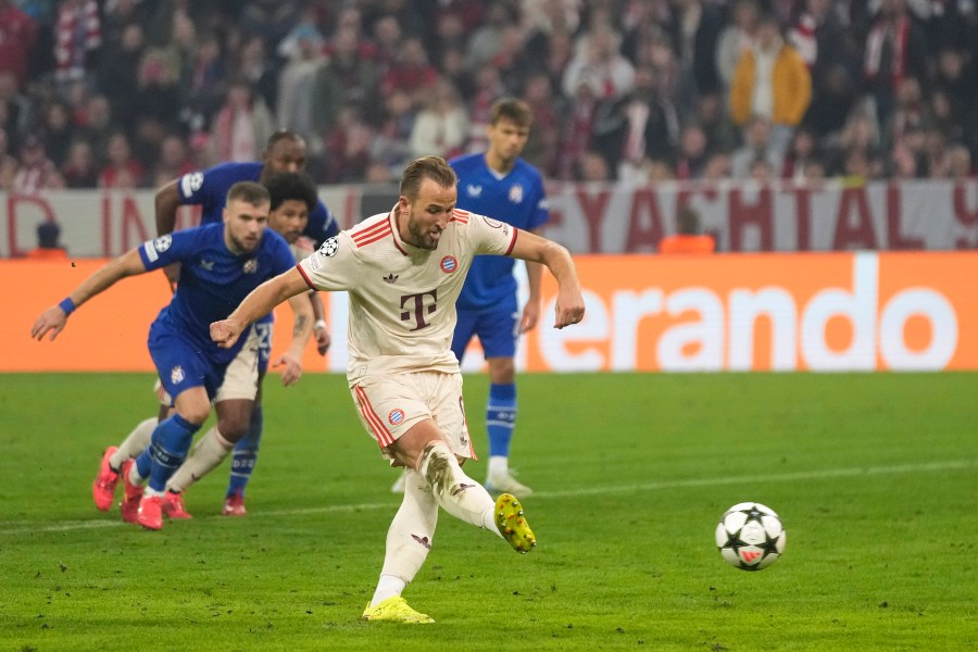 Bayern's Harry Kane scores his sides 7th goal and his 4th of the game from the penalty spot during the Champions League opening phase soccer match between Bayern Munich and GNK Dinamo at the Allianz Arena in Munich, Germany Tuesday, Sept. 17, 2024. (AP Photo/Matthias Schrader)