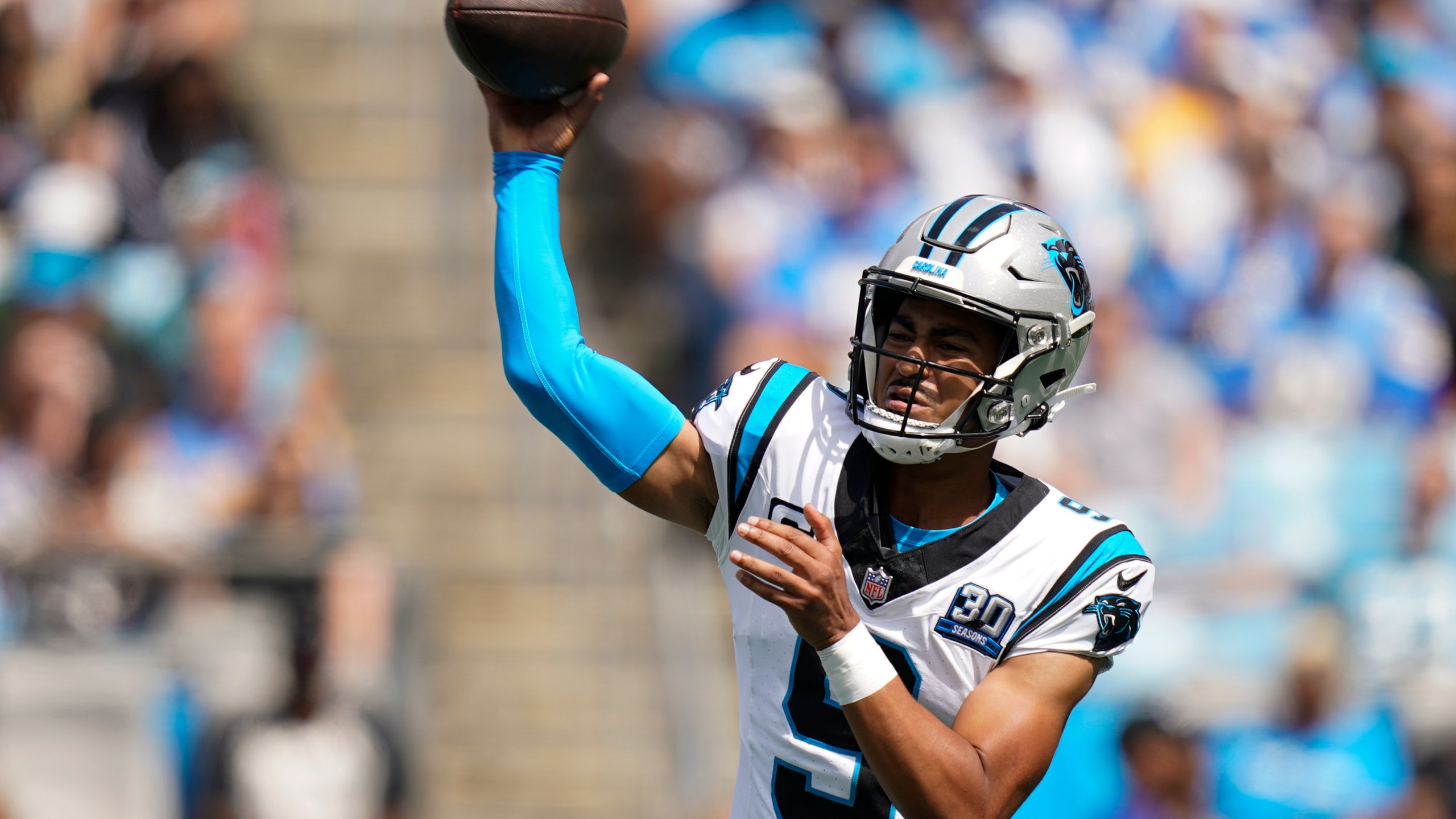 Carolina Panthers quarterback Bryce Young passes against the Los Angeles Chargers during the first half of an NFL football game on Sunday, Sept. 15, 2024, in Charlotte, N.C. (AP Photo/Erik Verduzco)